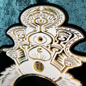 Intricate wooden birthday key with a traditional design