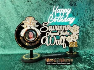 Custom wooden 21st birthday key on display stand in Australia