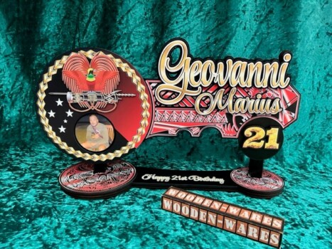 Bold engraved birthday key in natural wood