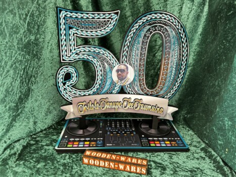 Intricate wooden birthday key with fine engravings