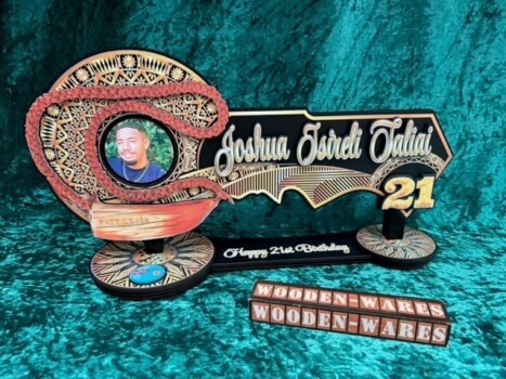 wooden birthday key with artistic carvings